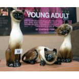 3 porcelain cat figures