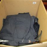 A box of railway trousers etc