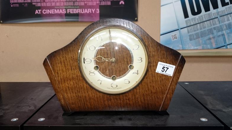 A mantle clock with keys & pendulum (in working order)