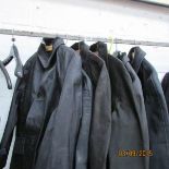A quantity of railway overcoats