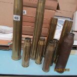 9 old brass shell cases