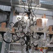 A 5 light metal and glass chandelier