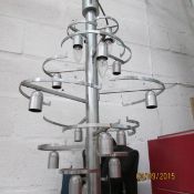 A large ballroom light with droppers