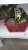 A crate of oil lamp burners etc.