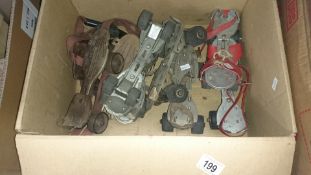 3 sets of old roller skates etc