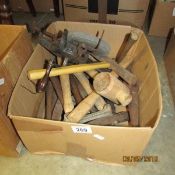 A box of hammers, pick hammers,