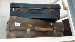 2 old suitcases