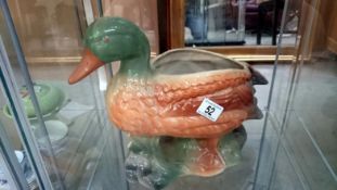 A pottery duck vase