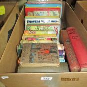 A box of children's annuals and books including Enid Blyton