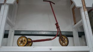 A vintage child's scooter