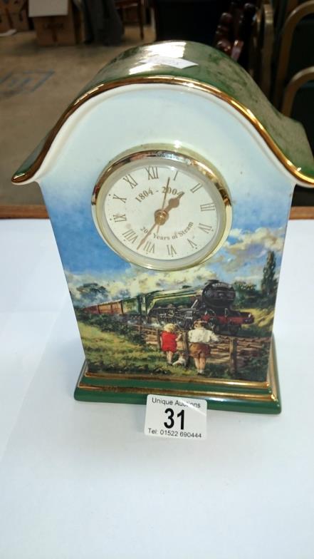 A Flying Scotsman porcelain clock