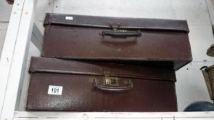 2 old suitcases