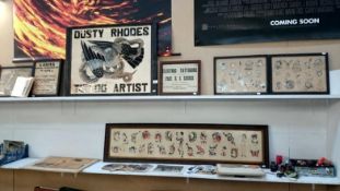 A shop sign, tattoo 'flashes' & designs, Framed & glazed advertising original designs,