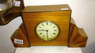 An Art Deco inlaid mantel clock