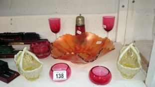 A mixed lot of cranberry glass including sifter,