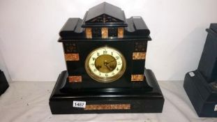 An Edwardian black slate mantel clock