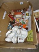 A box of toys including dolls,