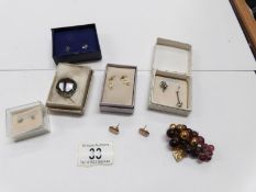 A quantity of earrings including silver