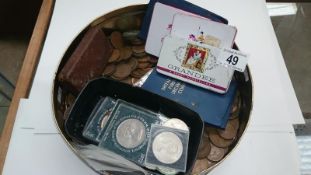 A tin of mixed UK coins