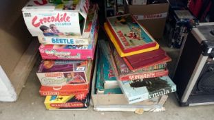 A quantity of old boxed games including Triang Tri-onic kit A and Kit A-B electronic construction