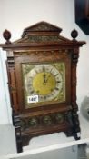 A Victorian oak mantel clock,