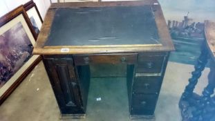 A Victorian kneehole desk