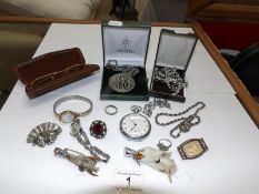 A mixed lot of costume jewellery, brooches,