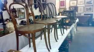 A set of 4 Bentwood chairs