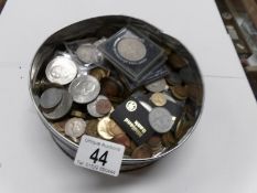 A tin of mixed UK coins including crowns