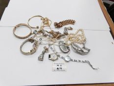 A mixed lot of costume jewellery, pearls,