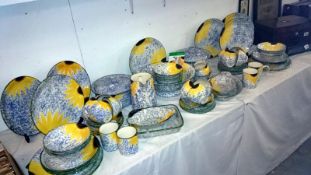 Approximately 77 pieces of Pool pottery 'Vincent' design by Anita Harris including Dinner plates,