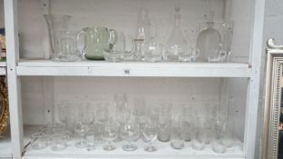 2 shelves of assorted glass ware