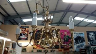 A polished brass 6 lamp ceiling light