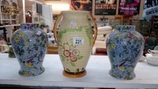 A pair of 'Lambeth' chintz vases and a Wood's vase