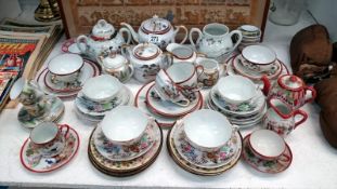 A large quantity of Oriental tea ware including Geisha