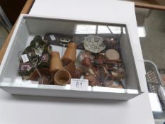 A small display box and contents including beadwork, silver topped scent bottle, yoyo,