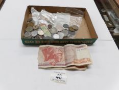 A mixed lot of foreign coins and bank notes