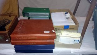 A large collection of stamps including albums, first day covers,