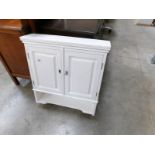 A painted wall cabinet