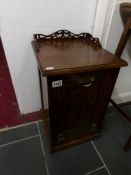 A Victorian coal cabinet