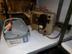 A rare Kodak Brownie 8 projector with films