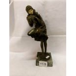 A reproduction art deco style bronze figurine