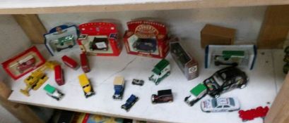 A mixed lot of die cast vehicles, some boxed,