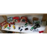 A mixed lot of die cast vehicles, some boxed,