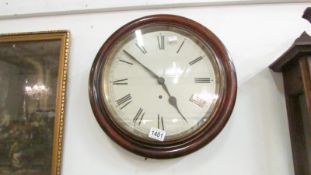 A circular wall clock (not working)