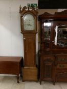 An early 19th century oak long case clock, Thomas Revis,