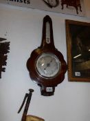 A barometer/thermometer