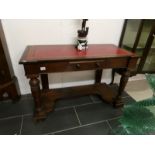 A Victorian leather top writing table