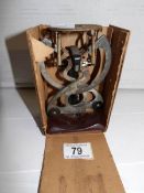 A set of Edwardian postal scales in original distressed box