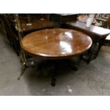 An oval mahogany inlaid loo table